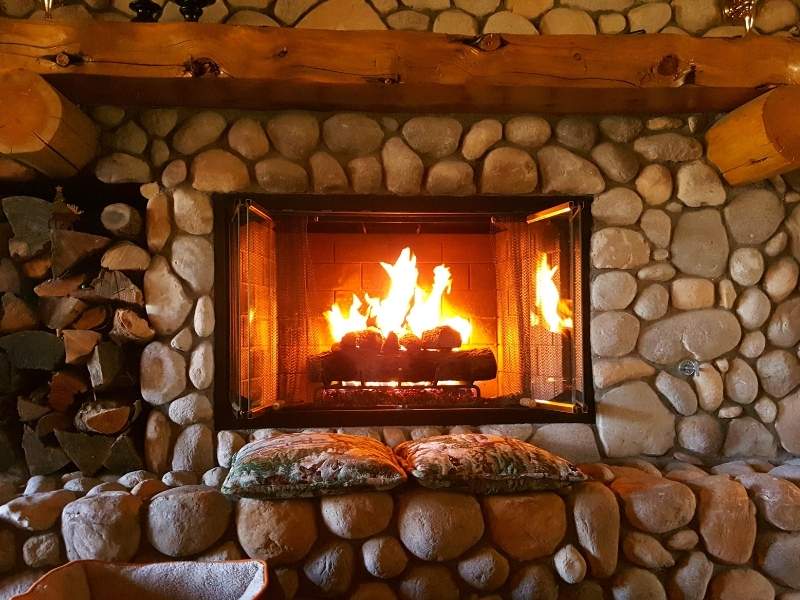 Stone hearth and fireplace surround designed for a large fireplace opening in Huntsville, AL.